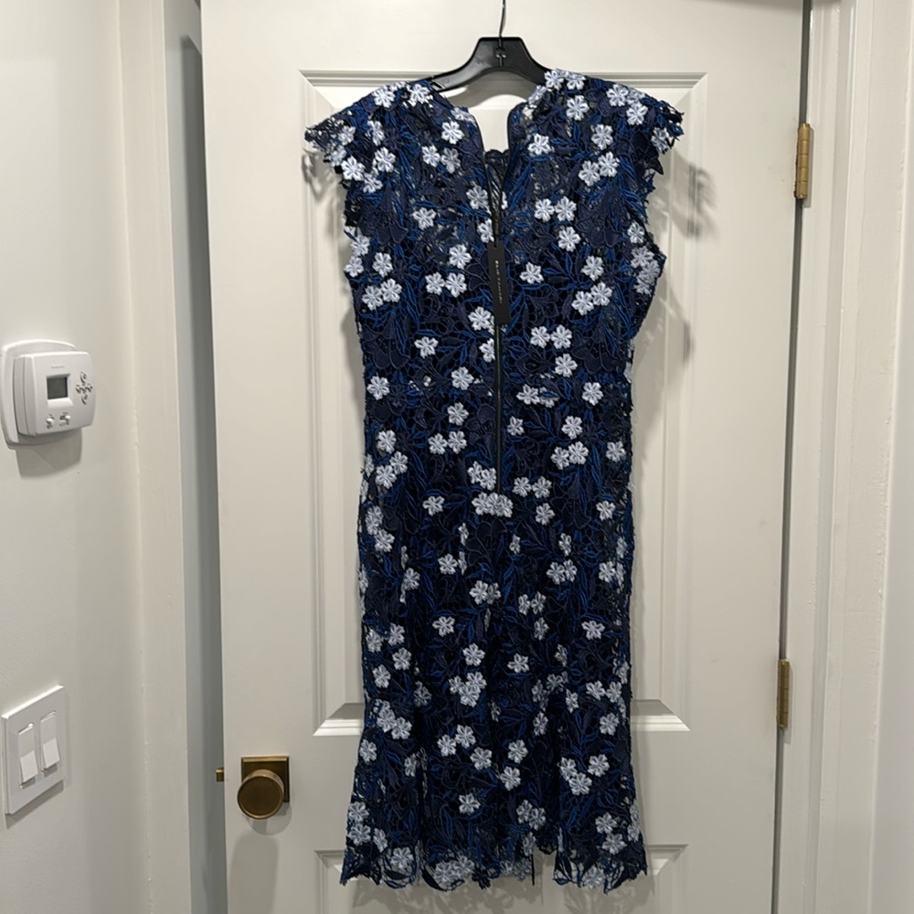 Elie Tahari Florence dress in ocean multi. Size 10. No damage. New with tags.